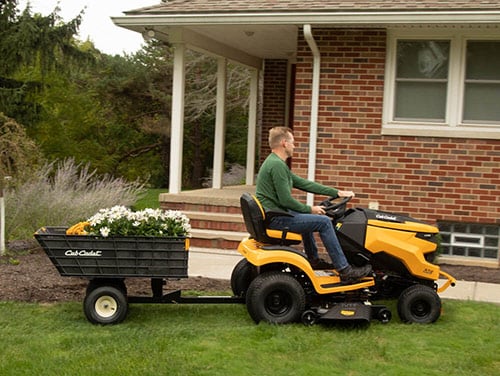 The Cub Cadet Hauler yard cart is versatile and saves storage space